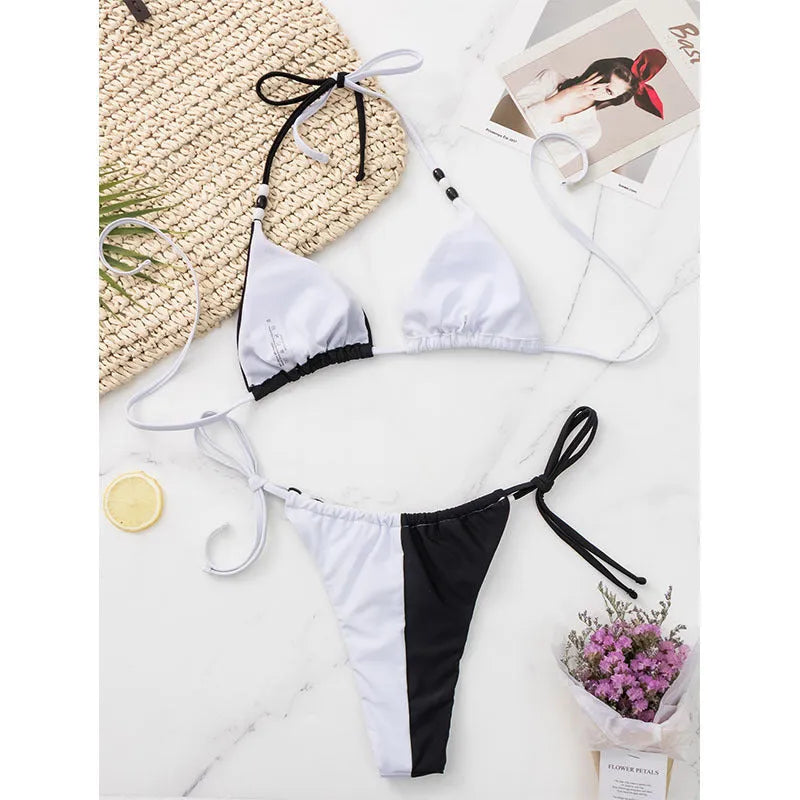 Women's black and white lace-up triangle cup bikini set with adjustable front ties