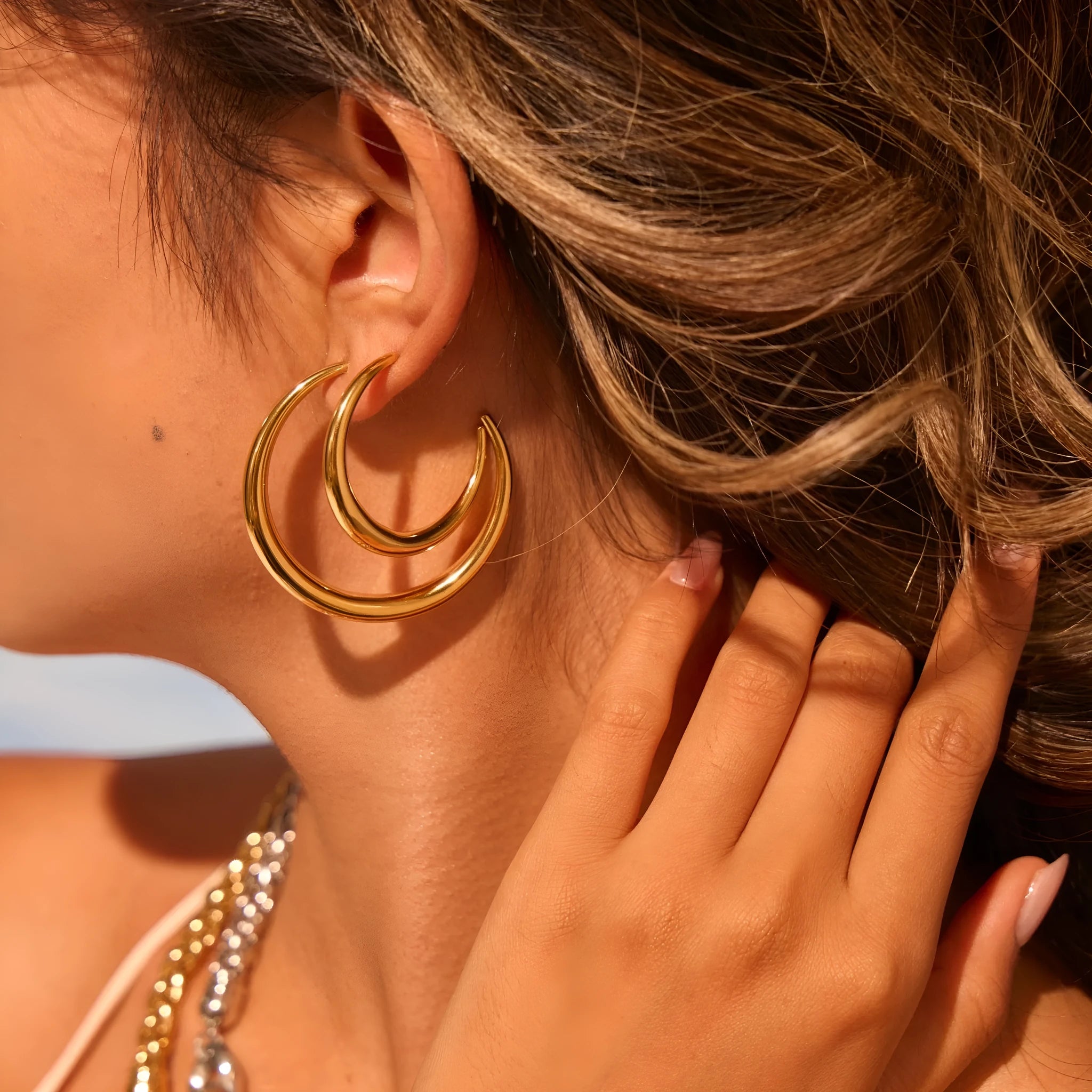 Geometric hoop earrings for women in stainless steel with gold or steel finish options