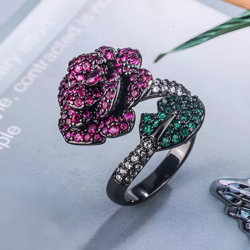 Black gold geometric flower ring with red simulation stones on gold-plated copper band