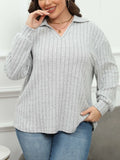 Women's plus size gray polo collar shirt with full lantern sleeves in a street fashion style.