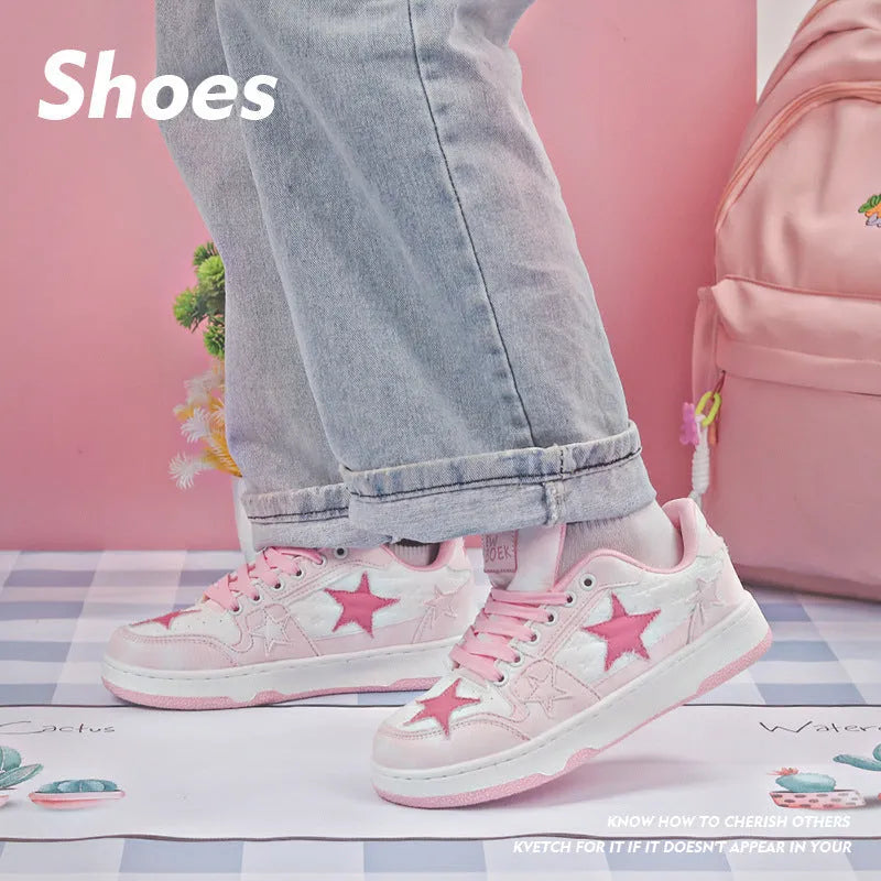 Denim skateboard shoes with round toe, rubber sole and front lace-up in pink, green and black colours