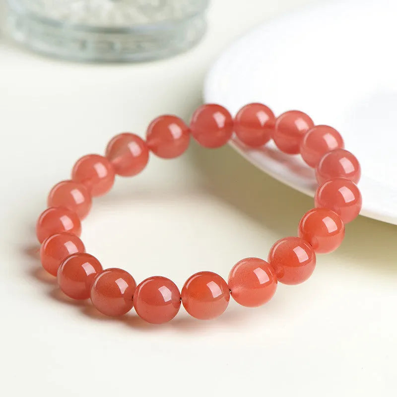 Natural South cherry red agate bracelet with polished beads in scattered design