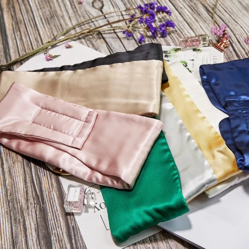 Mulberry silk sleep eye mask shown in champagne gold colour on a neutral background.