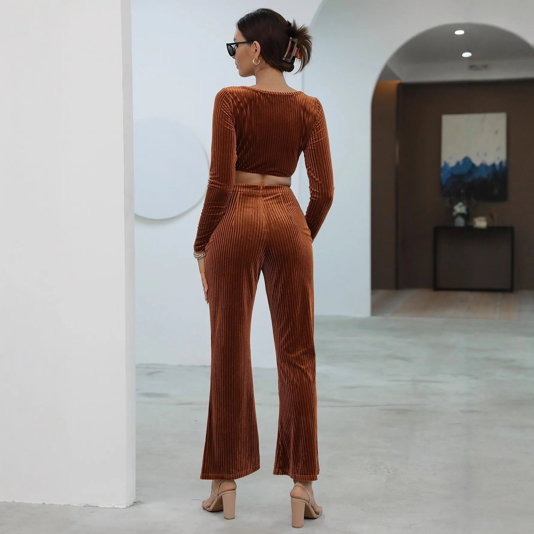 Caramel colour long sleeve sweater and trouser casual set laid flat