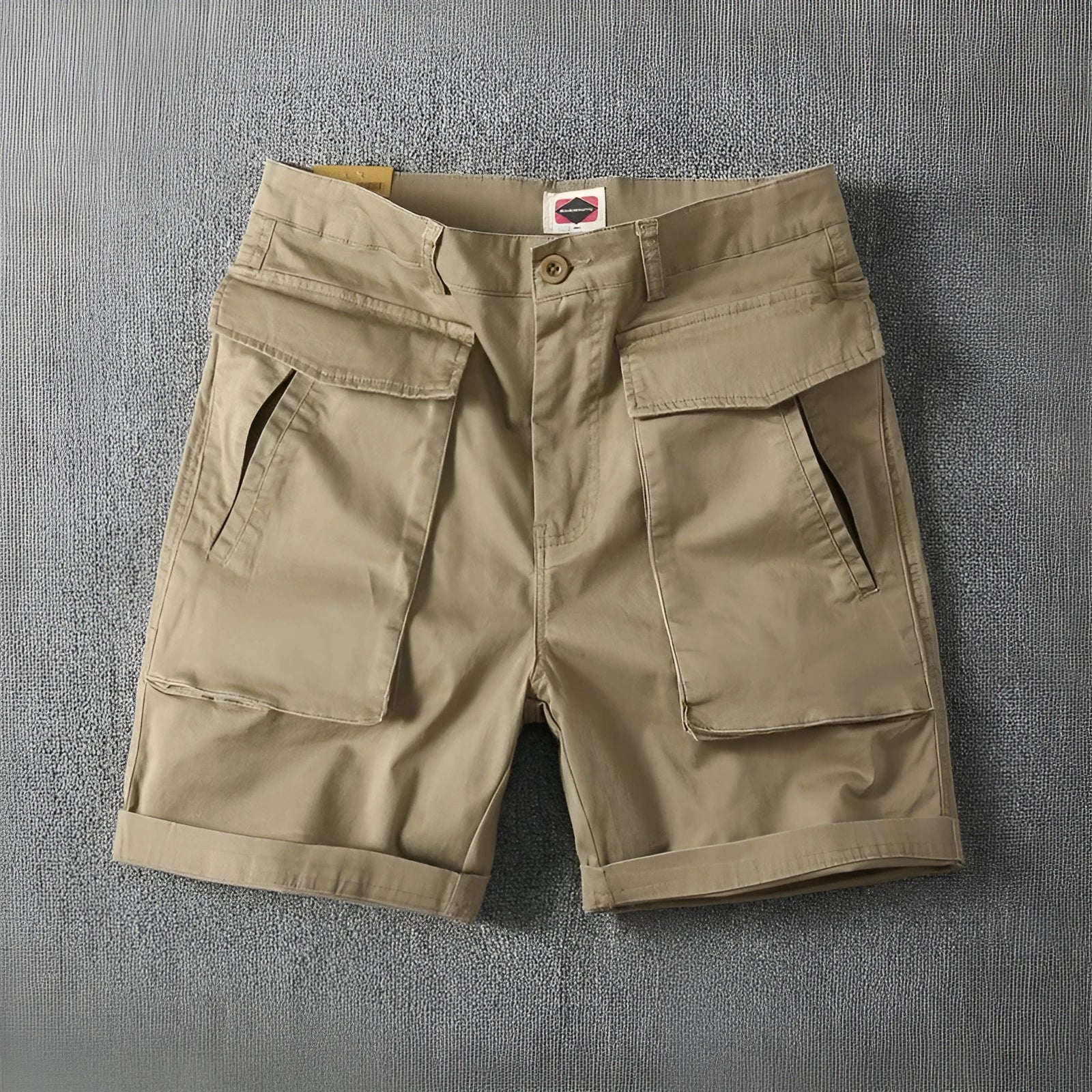 Men's straight-leg cotton cargo shorts in khaki with multiple pockets, shown for summer street style.