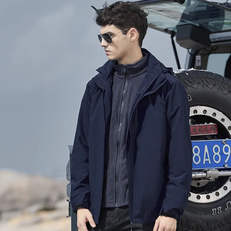 Men's black three-in-one waterproof mountaineering suit with cardigan style and removable lining for outdoor sports.