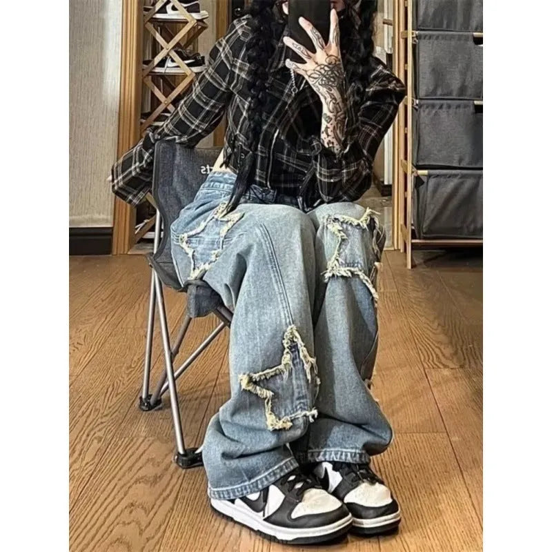 Blue high-waist women's jeans with a wide-leg straight cut on a mannequin.