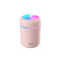 Black 300ml mini cool mist humidifier with multicolor LED night light on a desk