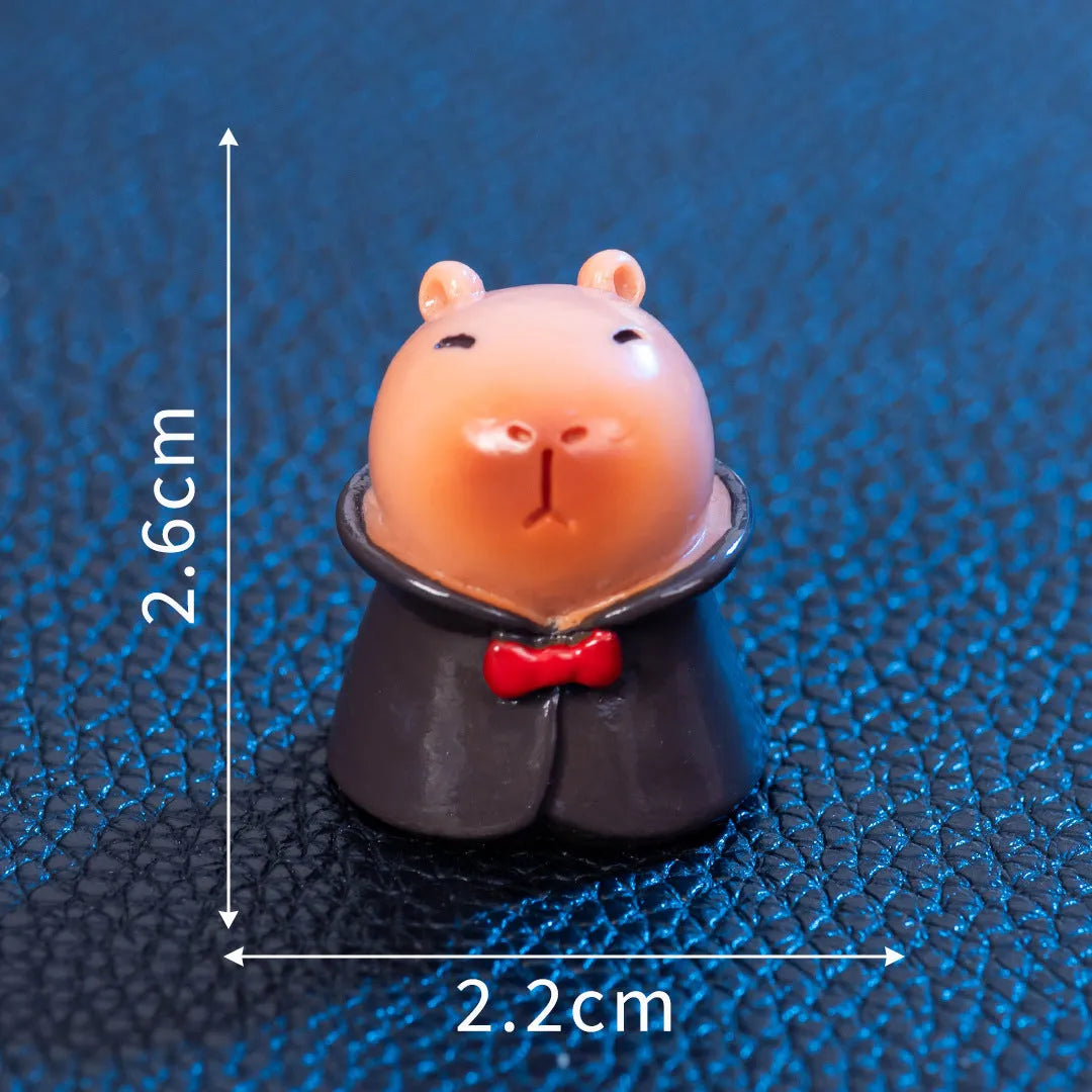 Set of eight micro capybara resin Halloween decorations in Pumpkin, Zombie, Ghost, Mummy, Vampire, Witch Hat, Little Devil, and Skull colours
