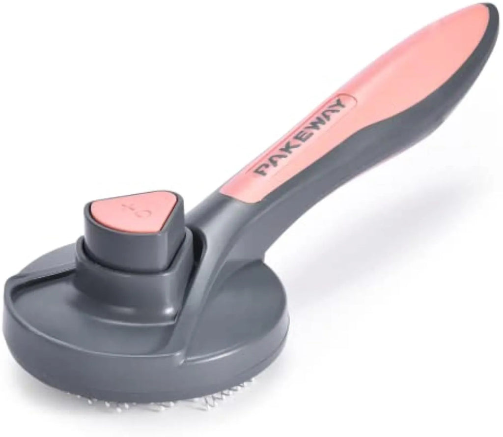 Grey self-cleaning slicker brush for grooming cats and dogs, showing comfort-grip handle and bristles.