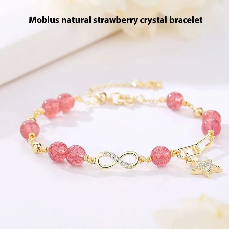 Natural gray moonstone Mobius crystal bracelet with polished finish on women's wrist