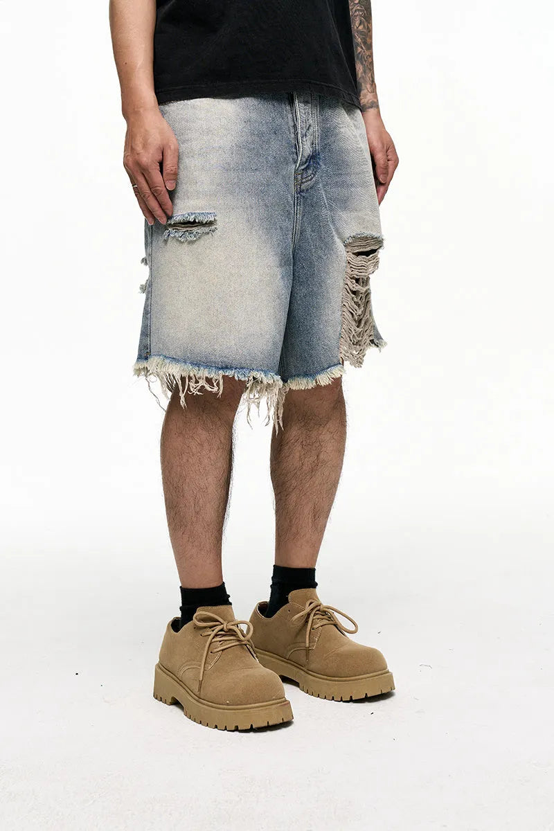 Men's light blue retro washed baggy denim shorts with wide leg cut and zipper fly