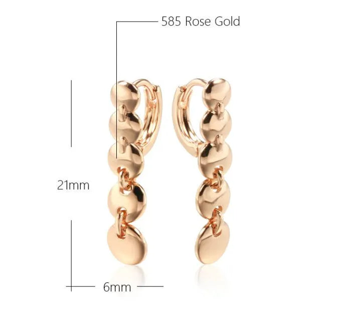 Gold retro long round circle drop earrings with woven wire construction.