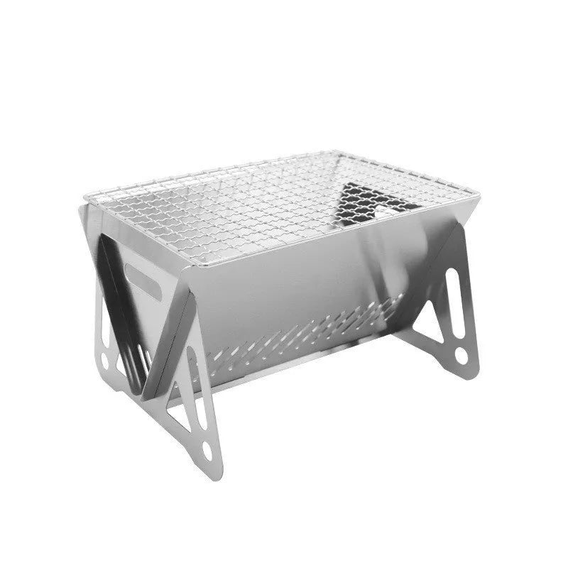 Large stainless steel folding barbecue oven for outdoor cooking, shown with its storage bag.