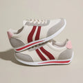 Blue and red lace-up low top sneakers with mesh upper and rubber sole