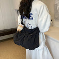 Ultra-light pleated crossbody student bag in polyester cloth with split pocket and mobile phone compartment