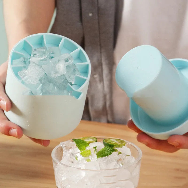 Portable 2-in-1 ice bucket mold with lid made of food-grade silicone in blue-green colour