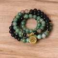 Green and black elastic beaded alloy bracelet with stretch design on wrist