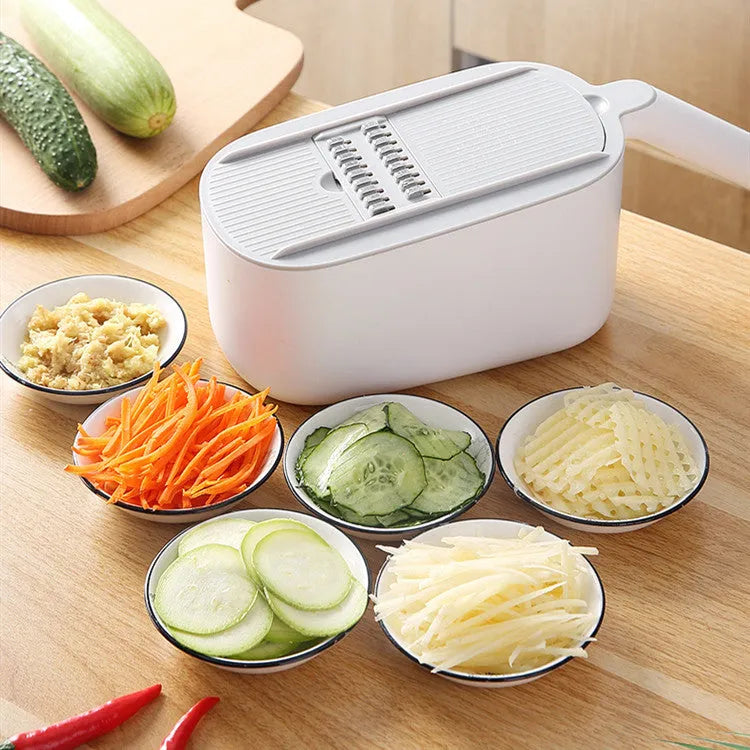 Multifunctional vegetable cutter with stainless steel blades in Nordic style, available in Blue, Grey, and Khaki colours