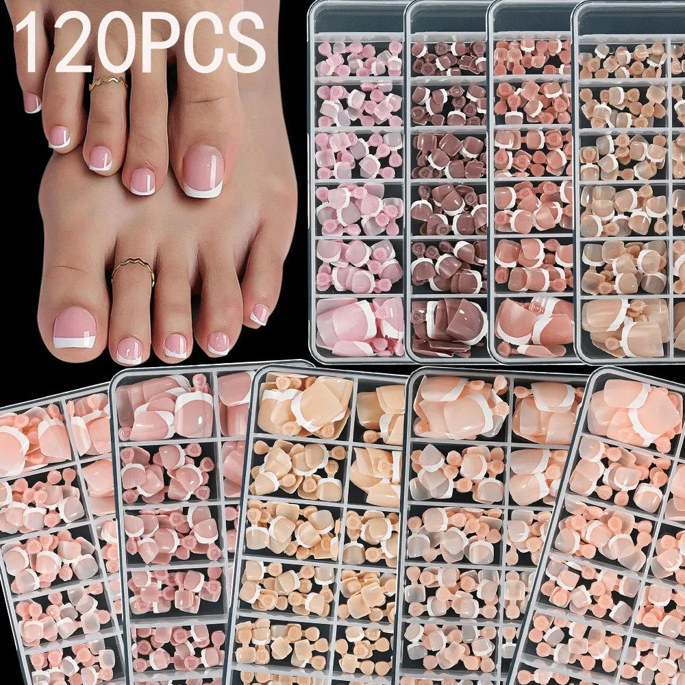 Box of 120 French white edge nude square short toe nail pieces in nine shades.