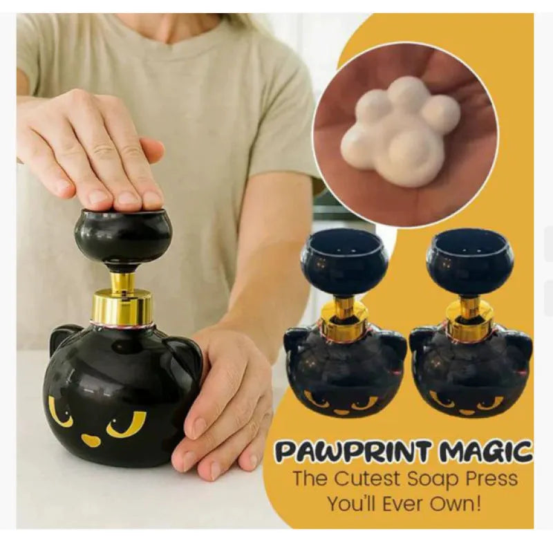 Black cartoon cat-shaped plastic soap dispenser pump bottle on a counter.