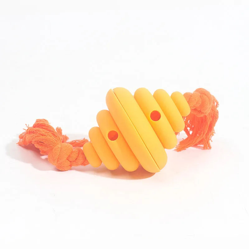Green and yellow dog ball with rope toy for large breeds showing treat dispensing slot