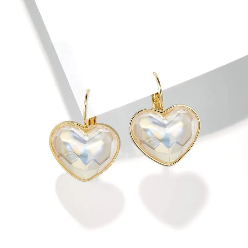 Gold coloured alloy ear clips for women with natural style and ear clip design