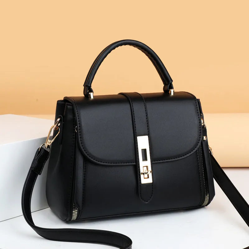Soft black PU leather women's messenger bag with a single strap, shown in a square vertical shape.