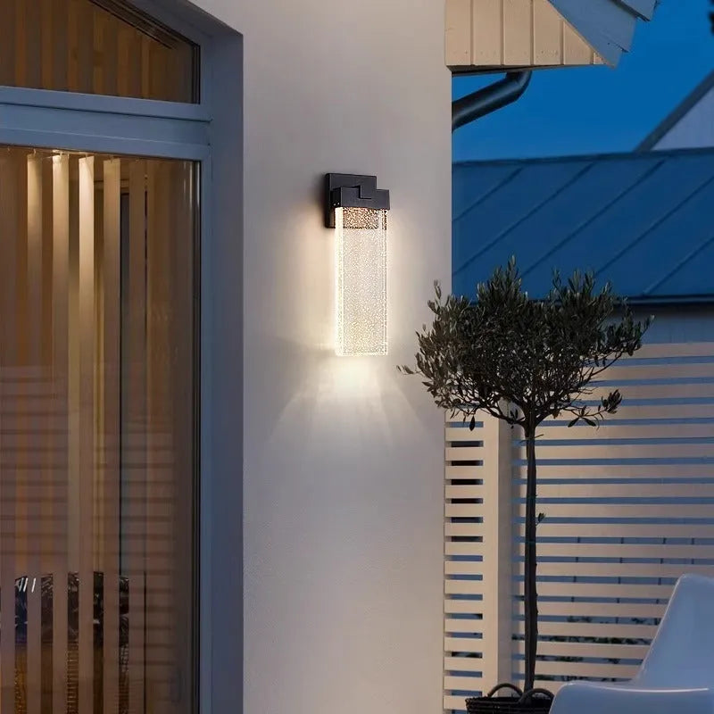 Black stainless steel outdoor LED wall lamp with warm light for courtyard or corridor