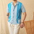 Royal blue striped short-sleeve polo cardigan with a lapel collar on a hanger.