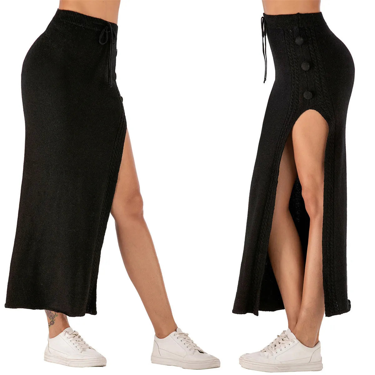 A woman wearing a slim-fit black acrylic skirt with a split hem and elastic waistband.
