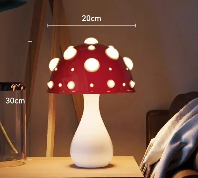Mushroom decorative table lamp with white base and tricolour light on a wooden nightstand