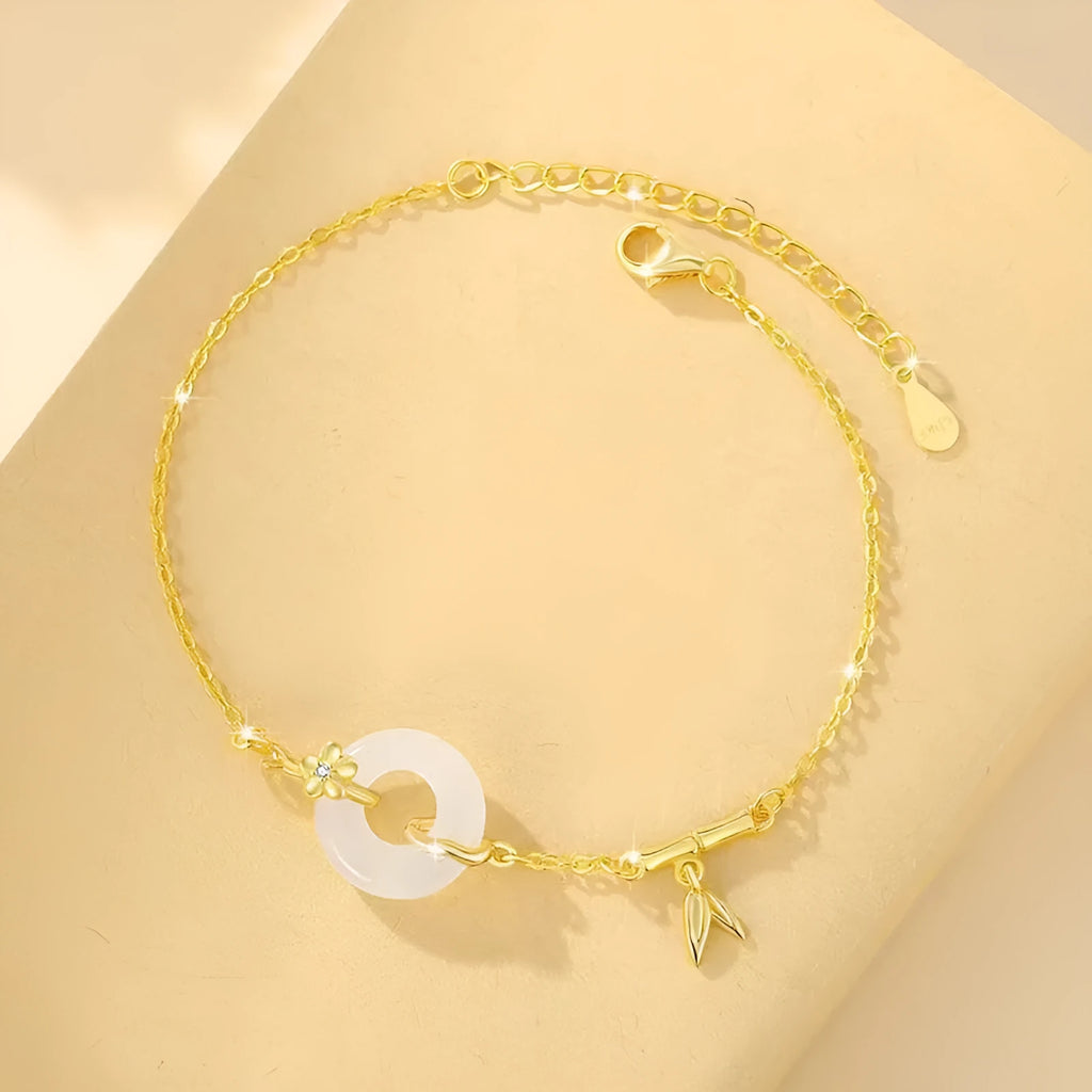 Silver white chalcedony bracelet with starry sky design and peace buckle on a neutral background
