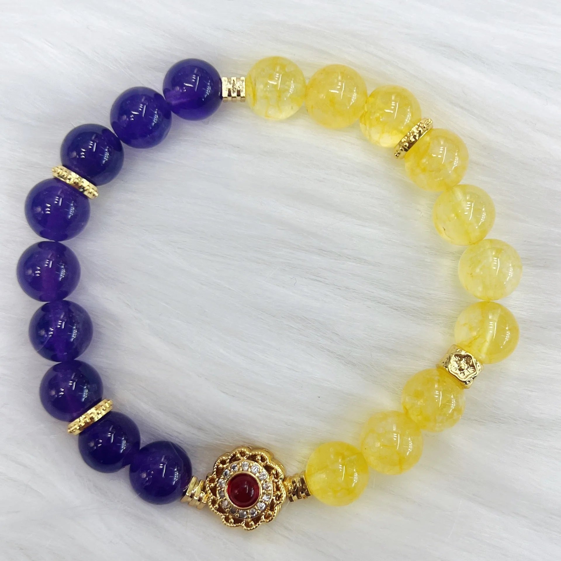 Handmade women's bracelet with yellow and purple amethyst crystal beads