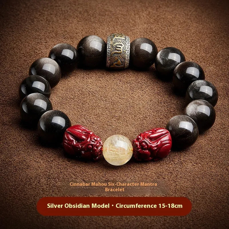 Natural cinnabar bead bracelet with carved animal zodiac design in gold obsidian and silver stone on a silver gift box