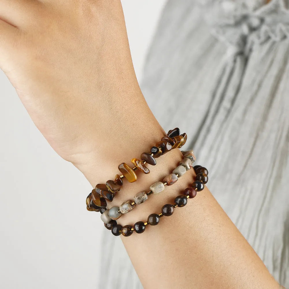 Natural tigereye bronze geometric bracelet with simple unisex style on neutral background