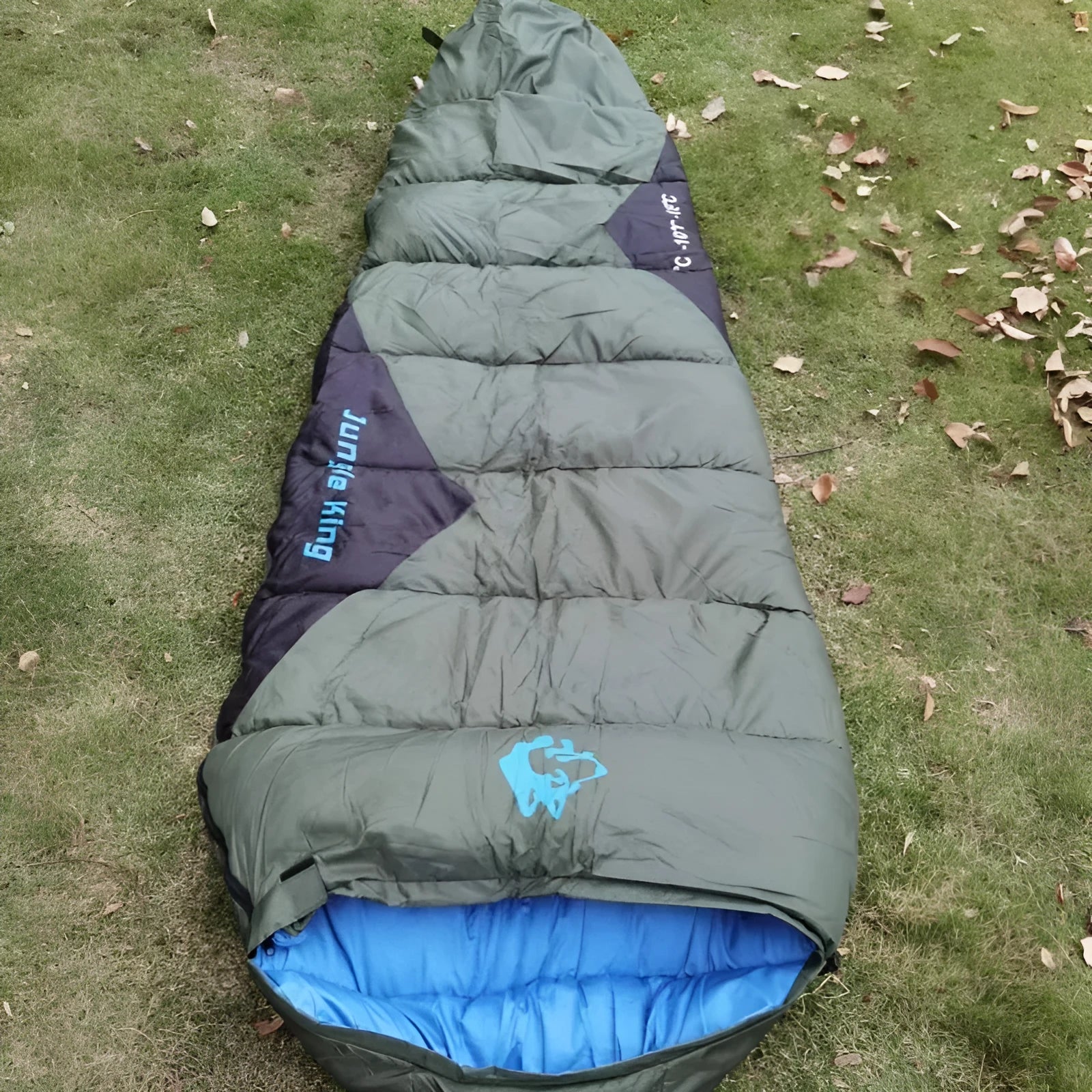 Cotton sleeping bag for camping and fishing in Army Green colour with compression storage bag