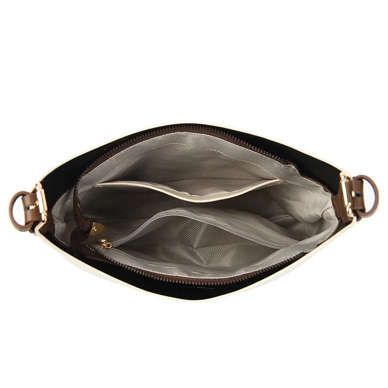 All-matching simple large-capacity bucket bag in black, urban simplicity style with stitching and lock detail