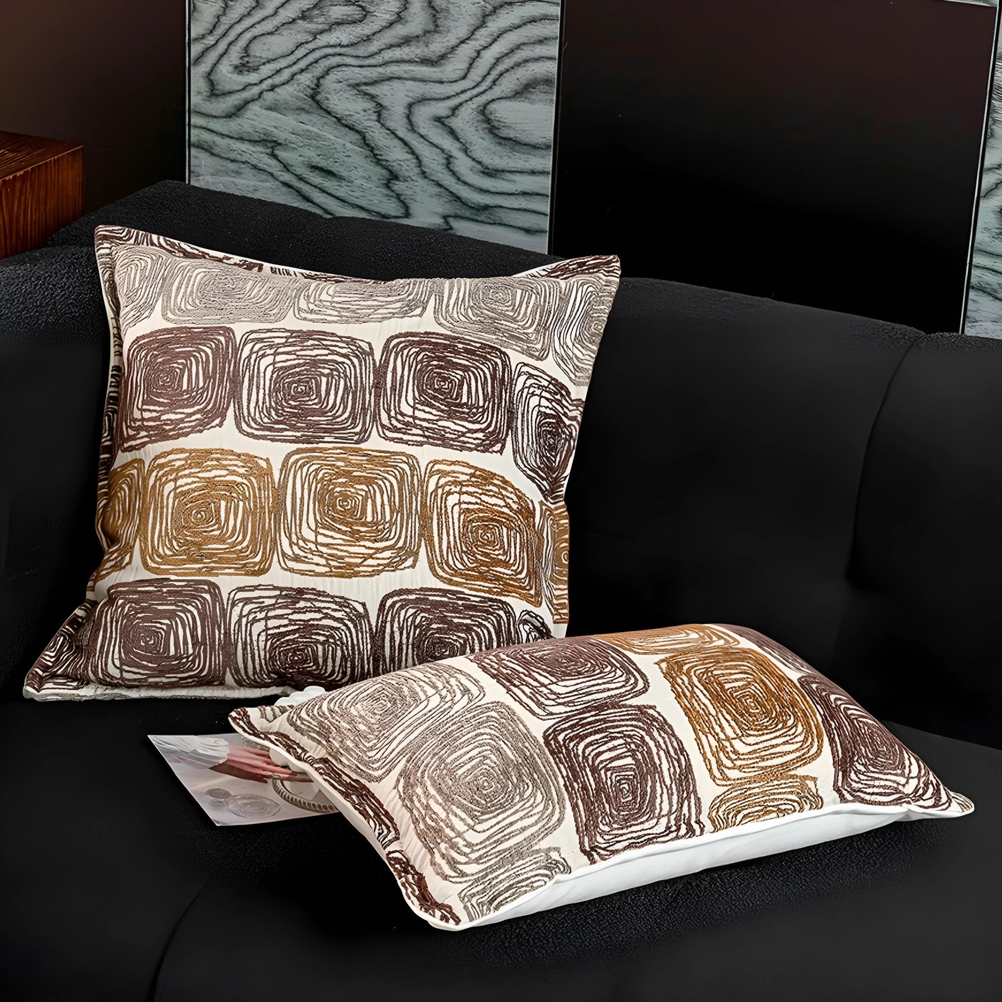 Square cream and coffee abstract coil pillow cover made of feather velvet polyester in 50x50cm or 30x50cm size.