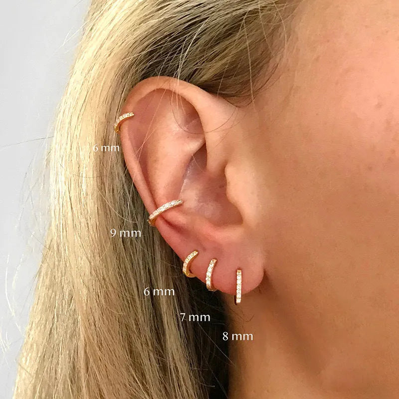 Circle zircon stud earrings in gold, rose gold and silver colours with geometric design