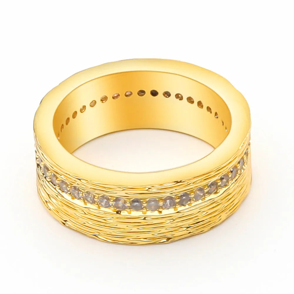 Gold-coloured geometric zircon ring for women with angular design on copper base metal