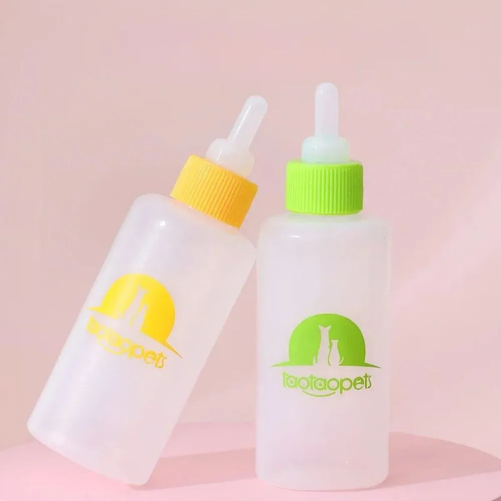 Four pet milk bottles in yellow, pink, blue, and green with cleaning brush on light background
