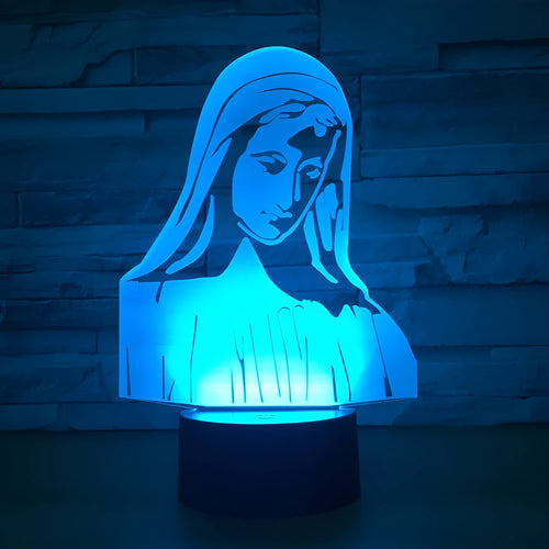3D LED night light showing colourful dual ring pattern, with remote control and USB cable.