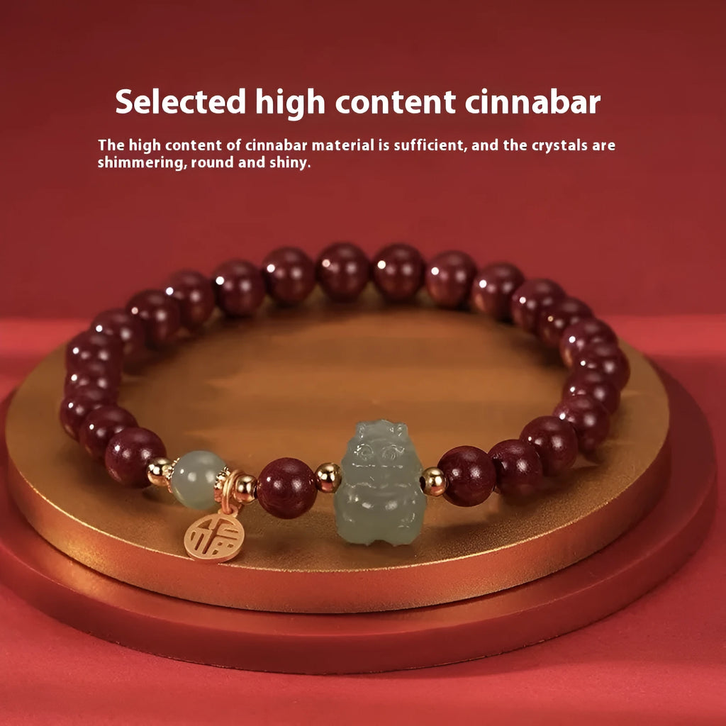 Natural Hetian jade cinnabar bracelet with 8mm beads, Emperor Sandstone style, on display
