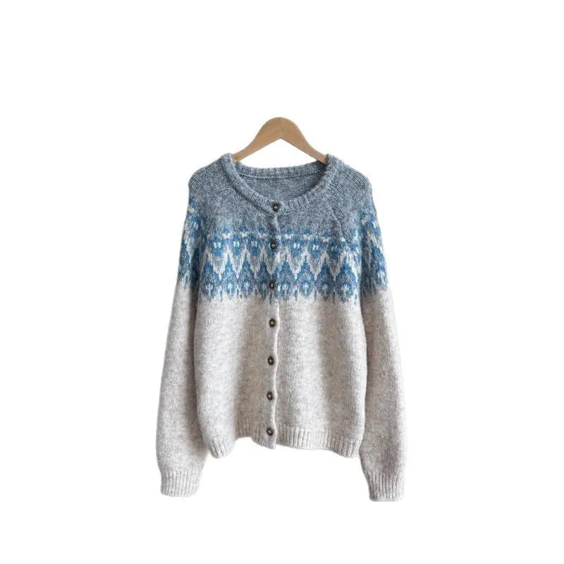 Women's jacquard knit sweater coat in a contrast colour, shown in a loose fit.