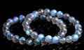 Natural cream body crystal blue moonlight bracelet showing polished finish on a simple band.
