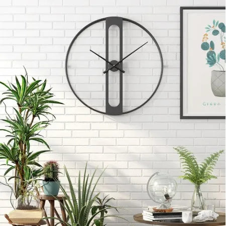 Round metal wall clock with 50cm diameter in black or gold colour options