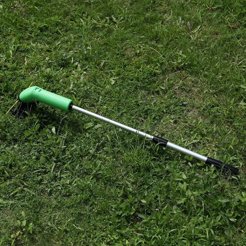 Cordless lawn trimmer weed trimmer with extension pole and debris shield on green grass