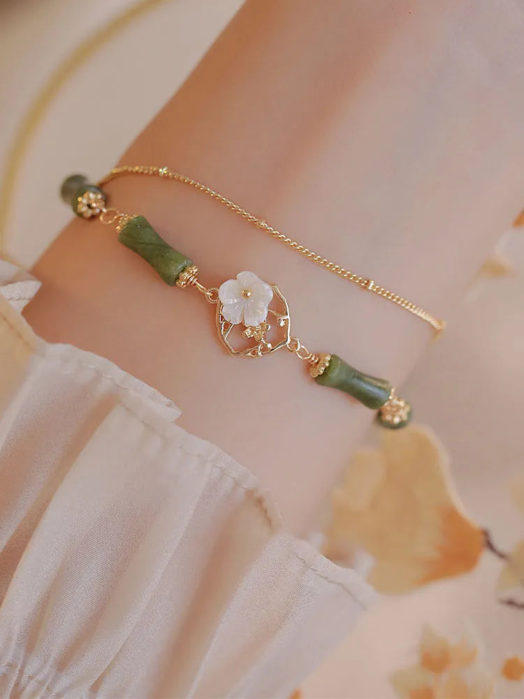 Natural olivine double layer bracelet with Twin Bells of Ireland charms and olive branch decoration