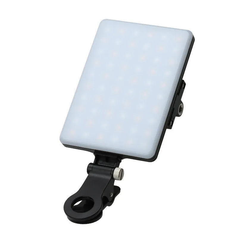 White portable LED mobile phone fill light with clip attached to a phone showing two-colour temperature modes and 250 Lux brightness